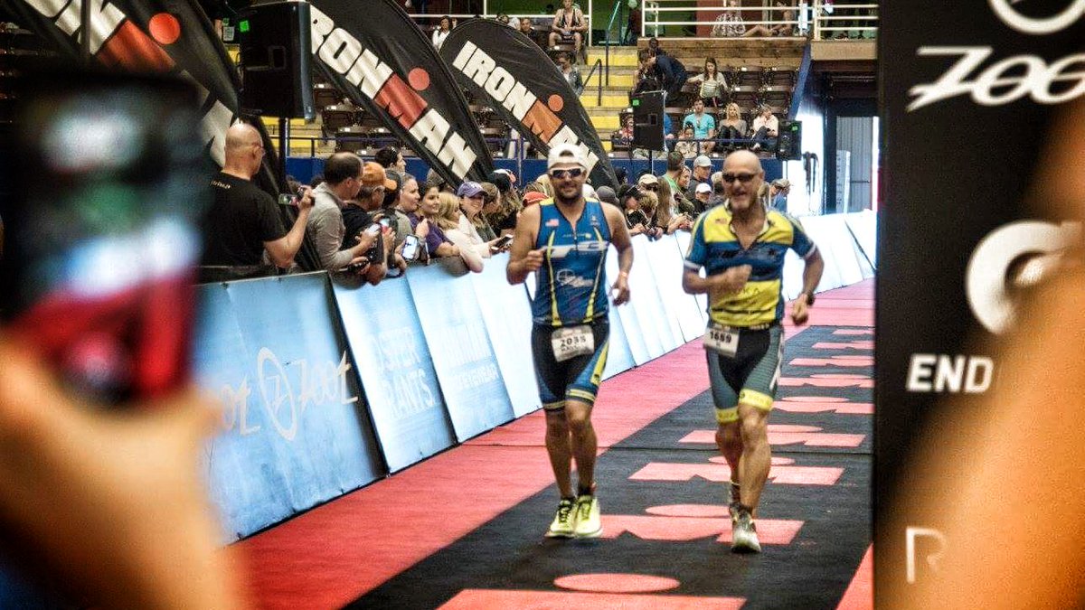 AustinT3's tweet image. Austin T3 coach and athlete crossing the finish line at Austin 70.3!