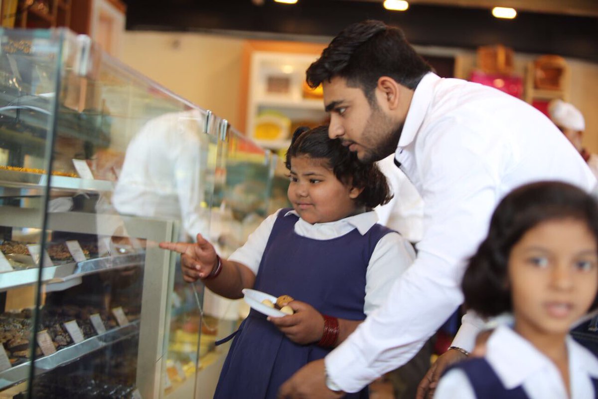NGO_MSVF's tweet photo. Time for the lesser privileged to enjoy lipsmacking sweets from dadus sweet emporio, at camp #msvfinitiative #helpalways #MomentsThatMatter https://t.co/55UpqHngFb