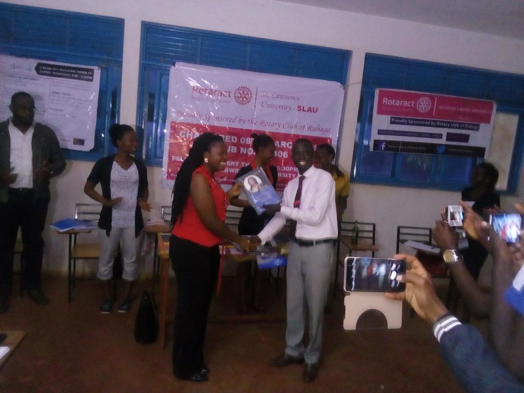RotaractUnik's tweet photo. Our very own IPP &amp;now ADDR Allan Mukasa giving the DRR the Gifts from SLAU &amp; Muteesa 1 University. Thanks for ever representing Rct Unik https://t.co/BV5C7bOYMf