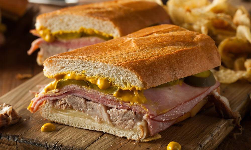 TBFoodTours's tweet photo. In celebration of #NationalSandwichDay we pay homage to our Dunedin Tour Partner @SandpiperCafe and their crowd pleasing Cuban! https://t.co/dddBE243h5