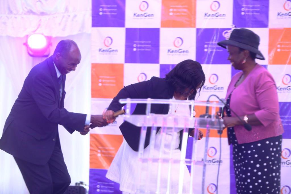 KenGenKenya's tweet photo. .@rebecca_miano receives a symbolic baton from her predecessor to signify change of guard at KenGen.#ThankYouAlbert #ChangeOfGuardKenGen https://t.co/dDZEIx3yGB