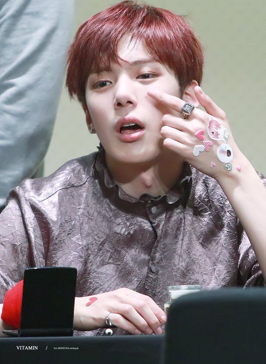his beautiful hands covered in cute stickers uwu
