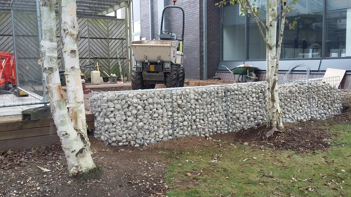 VPSGrounds's tweet photo. Retaining wall using Gabion baskets filled with stone, now onto the base for a refrigeration unit for @nokia working with @Overburyplc https://t.co/ah2hAEjZbc