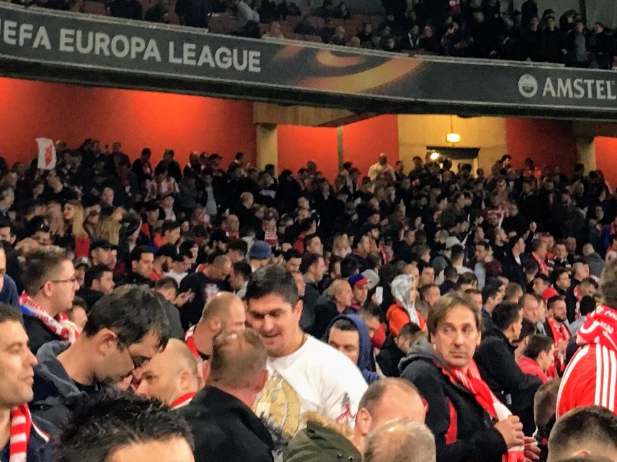 thekrazykobra's tweet photo. I’m reliably told that that was former NBA player Darko Miličić in the white shirt amongst Red Star Belgrade supporters at #ARSRSB https://t.co/rXeALnXJp2
