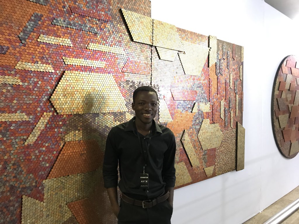 hey_ashiwel's tweet photo. Met Yaw Owusu who uses One Pesewa coins to make these fascinating pieces. I was really impressed speaking with him. #ArtXLagos https://t.co/342tRTYeRS