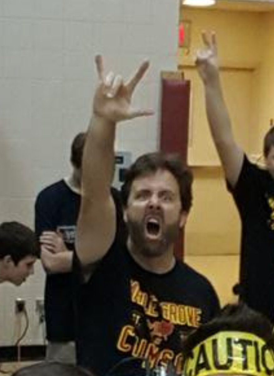 mgshBuller's tweet photo. Soo.... Here is our orchestra director. He likes to rock. @crimsonorch https://t.co/Or6pDjxCYV