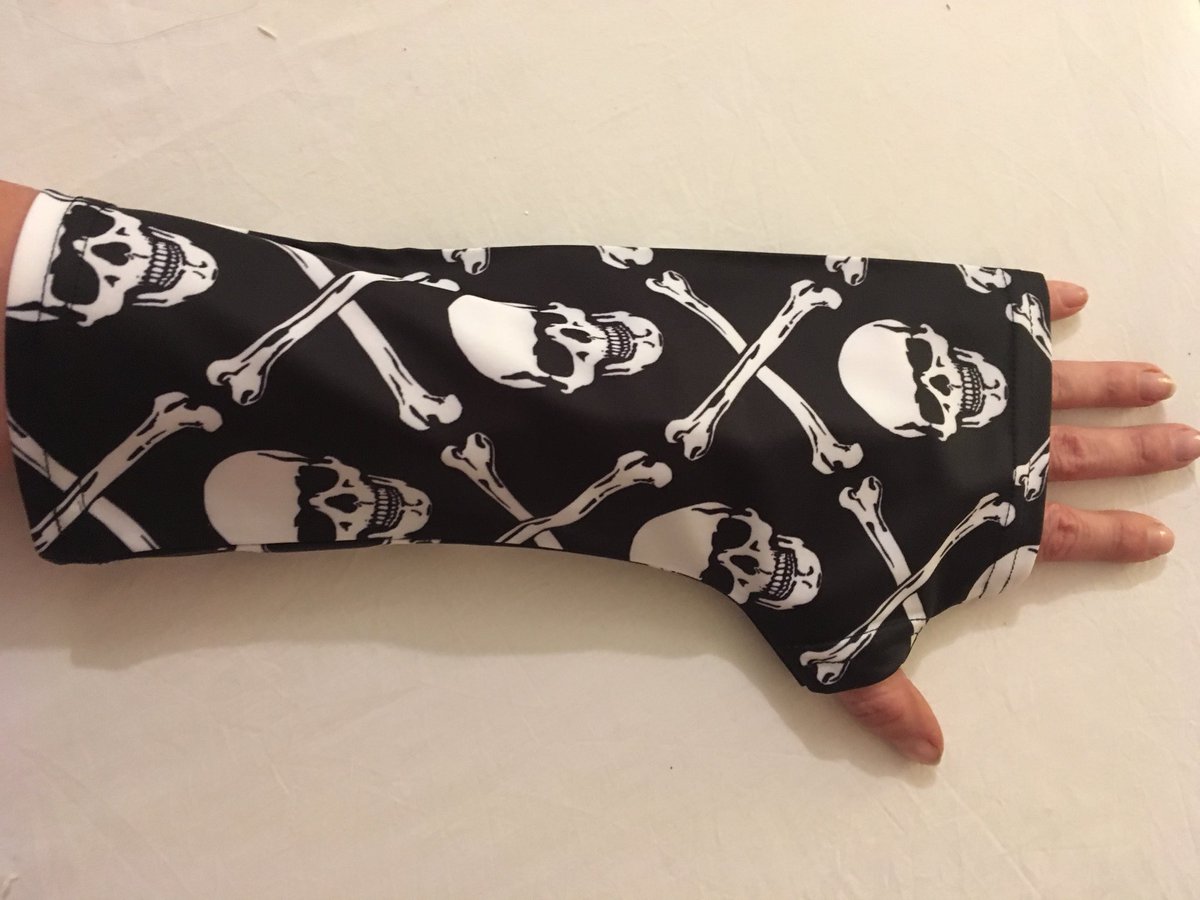super_sleeve's tweet photo. #castcovers for #brokenbones. See our new designs #spooky #halloween #skull #bones #fashionable cover for broken arm https://t.co/78gYEzYdbR https://t.co/AqPJKZlQFp