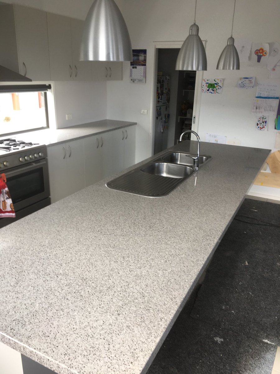 Is your kitchen bench top lacking overhang? Just extend it! #kitchenrenovations #benchtoprenovations #doneinaday #naturastone