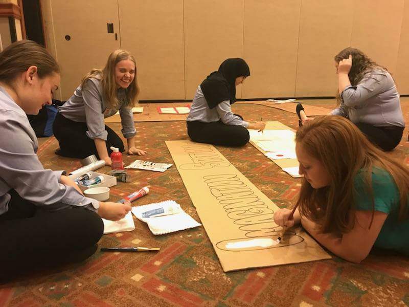 JosieLovesFBLA's tweet photo. Behind the scenes at OLI. Your state officers making our train station. #imagineoli #oli2017 @OregonFBLA https://t.co/Xslxr7X5fy