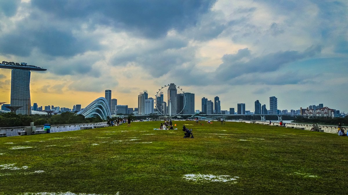 InThaime's tweet photo. Far, far in the park on top of a water container of some sort.  A peaceful end to a long walk - #photography #Singapore #postcard https://t.co/lmuqn2wN90