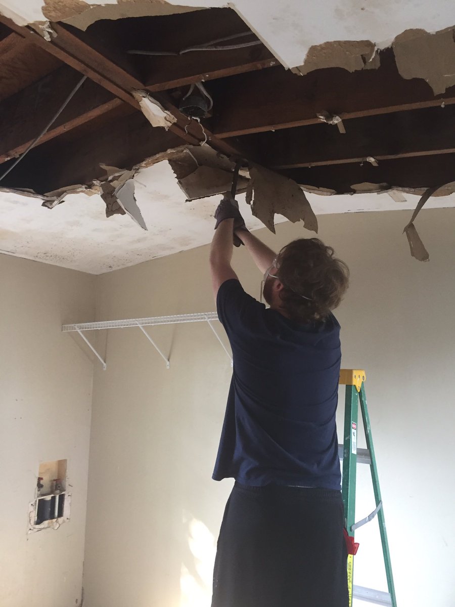 AustinSpurs's tweet photo. Works underway at Len's. Steve and Yitzak starting the demo. Tyler enjoying a @LoneStarBeer after finishing a room. #COYS #HurricaneHarvey https://t.co/tA6msdIlL9