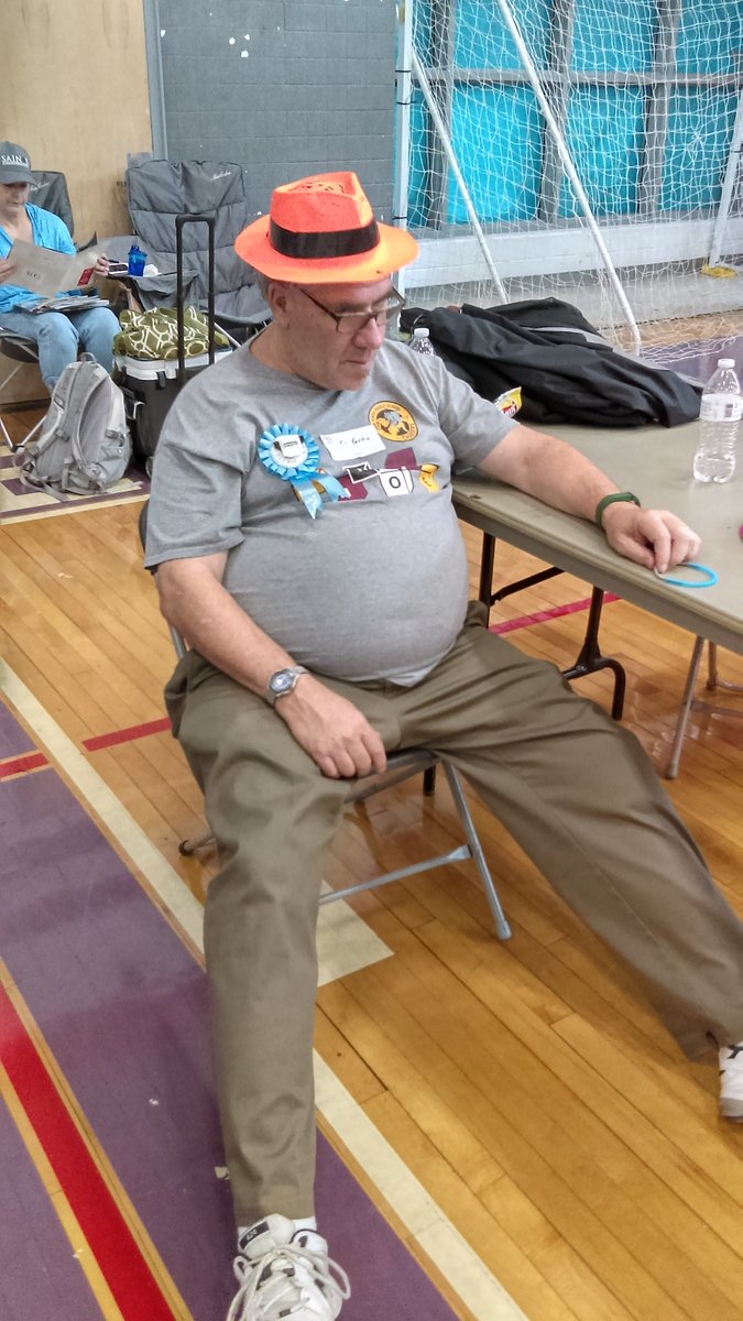 SciEduk8or's tweet photo. I may joke, but this guy is the best colleague and friend. He's $& years old and allowed to nap. How in this noise, I have no idea #NNFLL https://t.co/UnoRKSVwPD