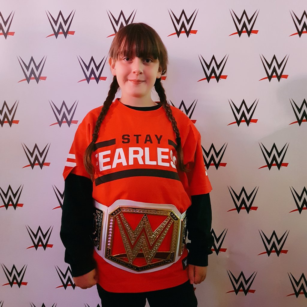 lifewithanguish's tweet photo. One happy girl after finding the WWE Women's Championship belt amongst her birthday presents ready for #WWEButlins at @Butlins Minehead https://t.co/Kqlpmk6Flb