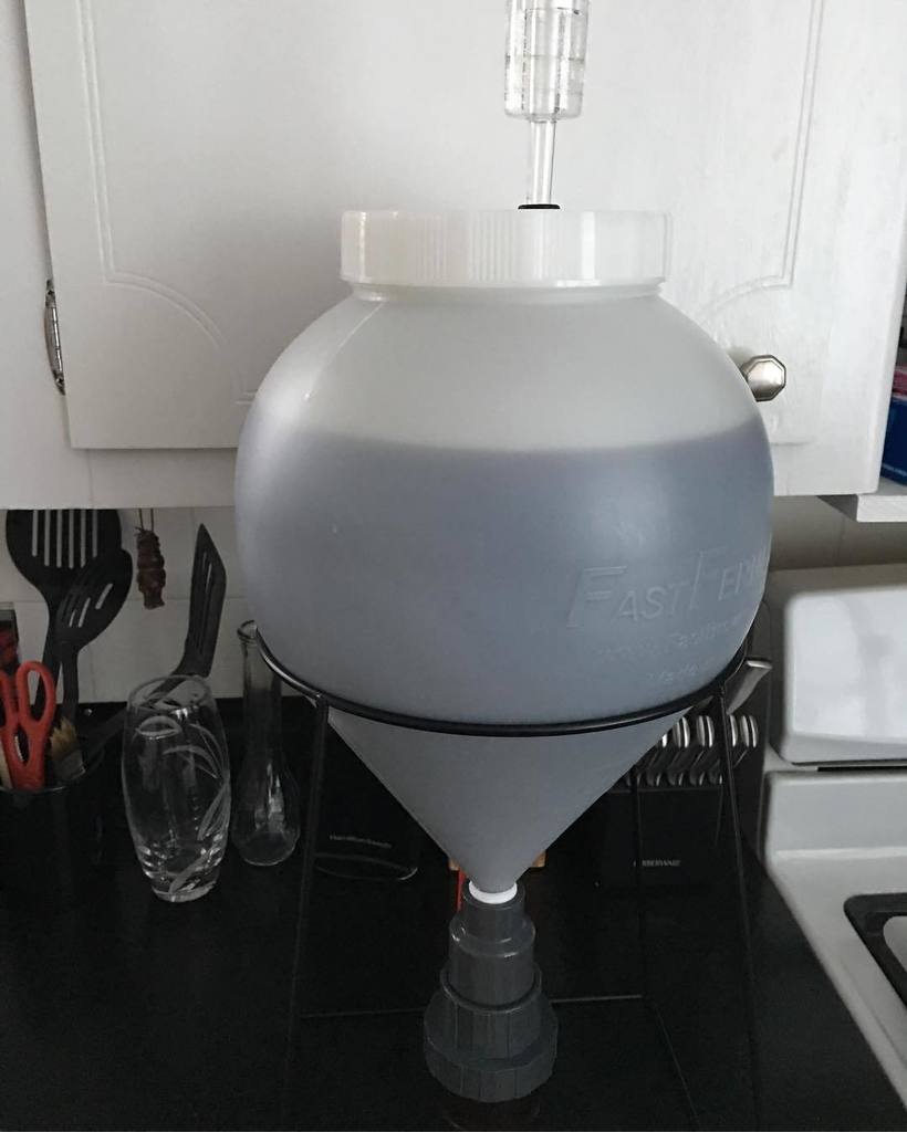 TikiTheBeerGod's tweet photo. First brew using the 3 gallon #fastferment fermenter. Thatโs me hanging under the kitchen counter. #Tiki #Homebrew. https://t.co/KYXAQHrSSz https://t.co/eW5RQwQpDc