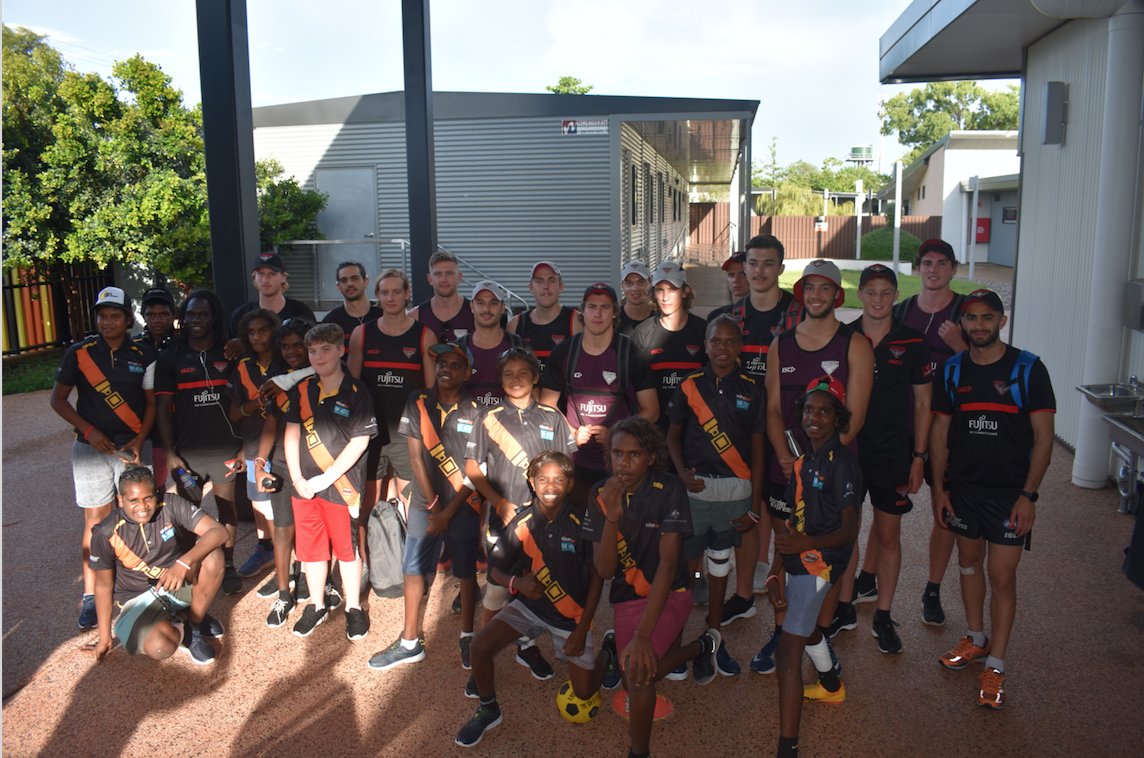 AFLNT's tweet photo. Check out these pics of the  Lajamanu boys when they had the opportunity to meet some of their @EssendonFC idols at the MLLLC! The boys have enjoyed playing football on green grass compared to the ochre sand of the Lajamanu Oval
#mlllc #schooleveryday #territoryfooty https://t.co/hG0mLpqFZh