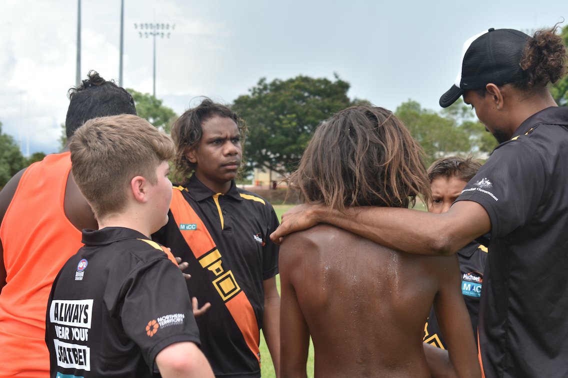AFLNT's tweet photo. Check out these pics of the  Lajamanu boys when they had the opportunity to meet some of their @EssendonFC idols at the MLLLC! The boys have enjoyed playing football on green grass compared to the ochre sand of the Lajamanu Oval
#mlllc #schooleveryday #territoryfooty https://t.co/hG0mLpqFZh