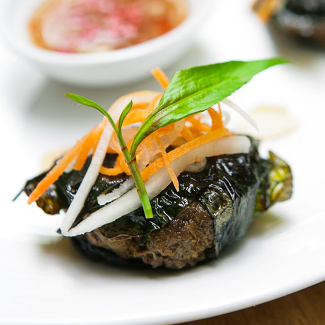 Street food turned upscale dining experience

Bo La Lo is a classic street snack in Vietnam. Bo means beef, and La Lot is a fragrant leaf more commonly known as Betel. To transform this everyday, authentic meal to a refined, luxurious dish, we use Wagyu beef, season with lemong