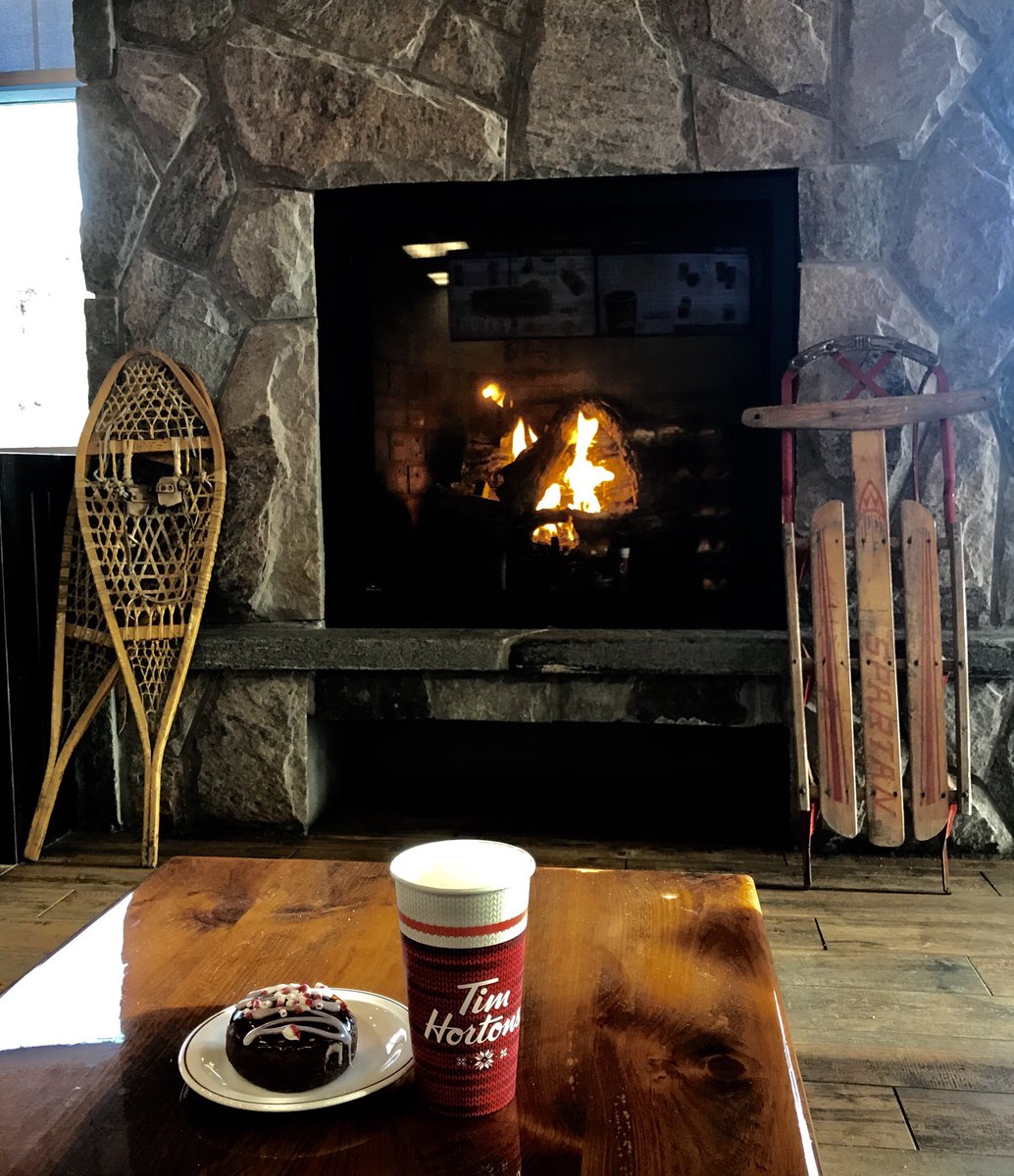 Warm up by our fireplace with one of our Holiday Treats ❄️☕️🍩🔥