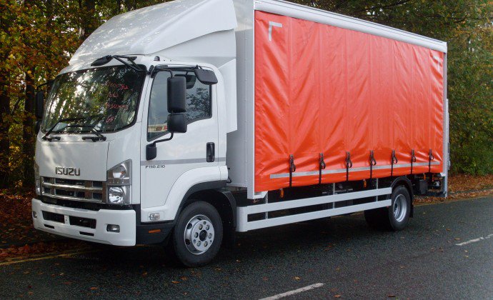 Curtain sided body, 3D cab deflector, rear wide lath shutter, 1500Kg tail lift on an Isuzu chassis #Isuzu #curtainsider #commercialvehicle