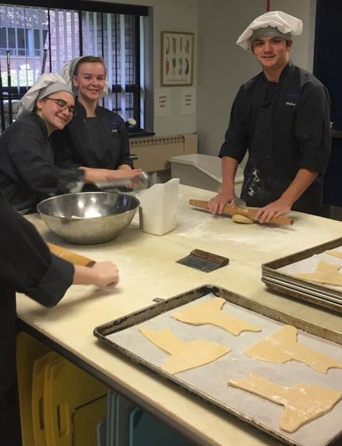 E2CCB's tweet photo. #CTE students in the Culinary Arts program at the LoGuidice Educational Center in Fredonia made dozens of New York State-shaped cutout cookies for local elementary students learning about NYS geography.  #WeCollaborate #OpportunityMakers #CTE #E2CCB #BOCES https://t.co/8LJeEx5DcS