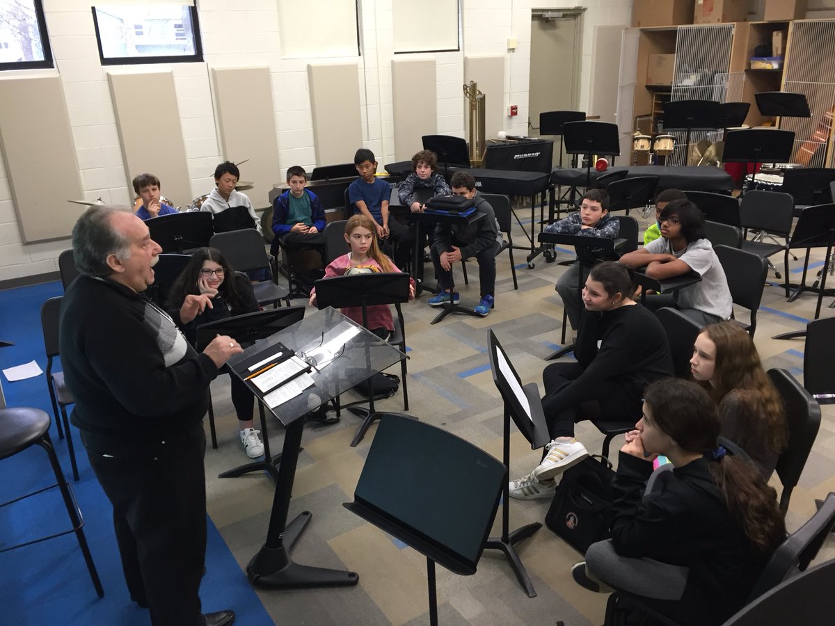 hpforward's tweet photo. Simon Kaplan presenting to 7th grade band about the history of Russia supporting our performance of “Moscow 1941” https://t.co/enaXFBJxhz