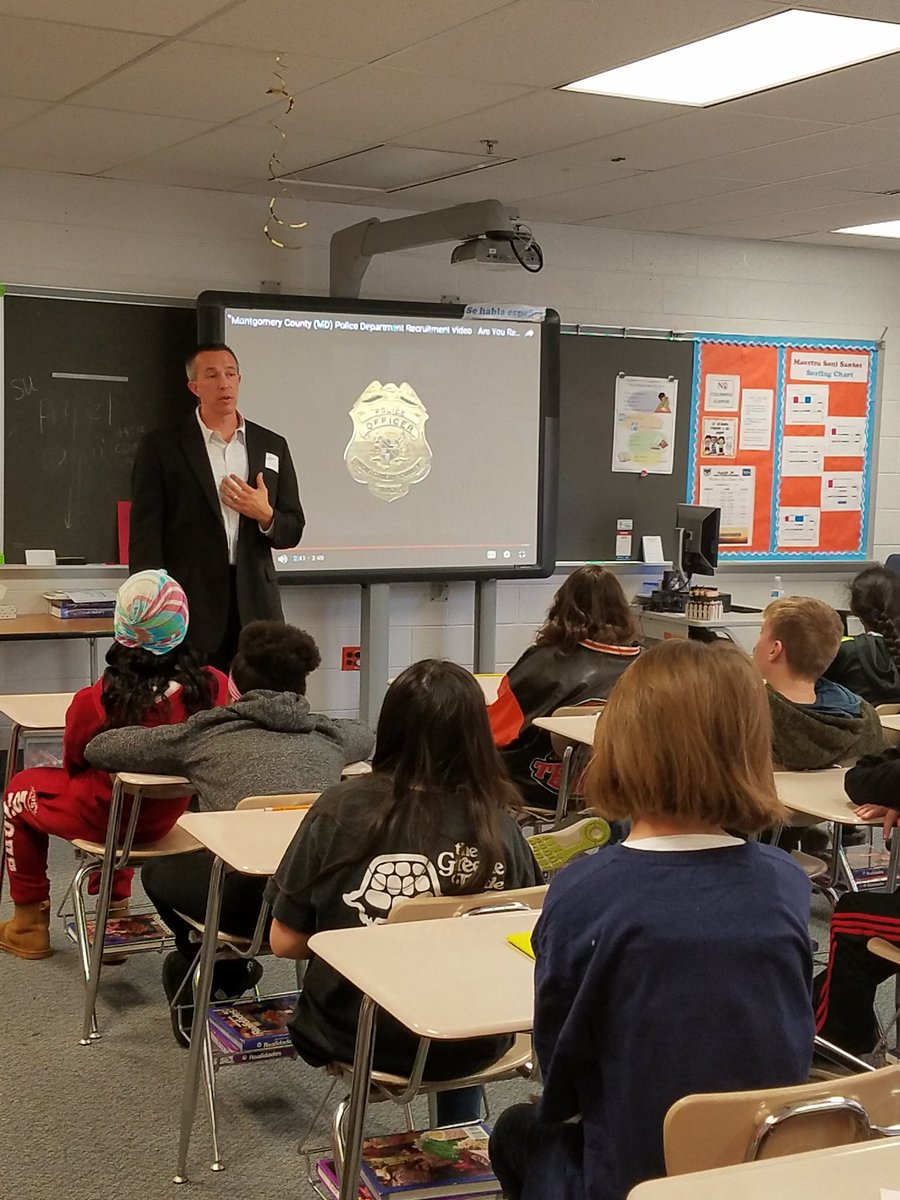 KMS_PRIN5's tweet photo. Officer Johnson &amp; Detective Wojdan share their experience as members of Montgomery County Police Department during KMS career day.   #DR2EAM BIG @KMSPTSA @mcpnews https://t.co/RfRtwDUP3B