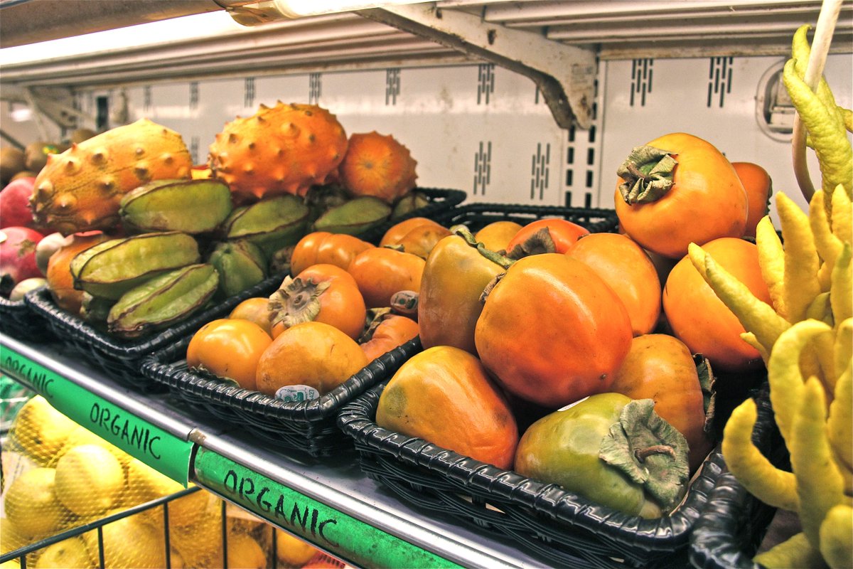 Whoo these persimmons are SWEET. Come on down and try one. You can't eat bananas every day ;)
.
#healthy 
#organic
#fruit
