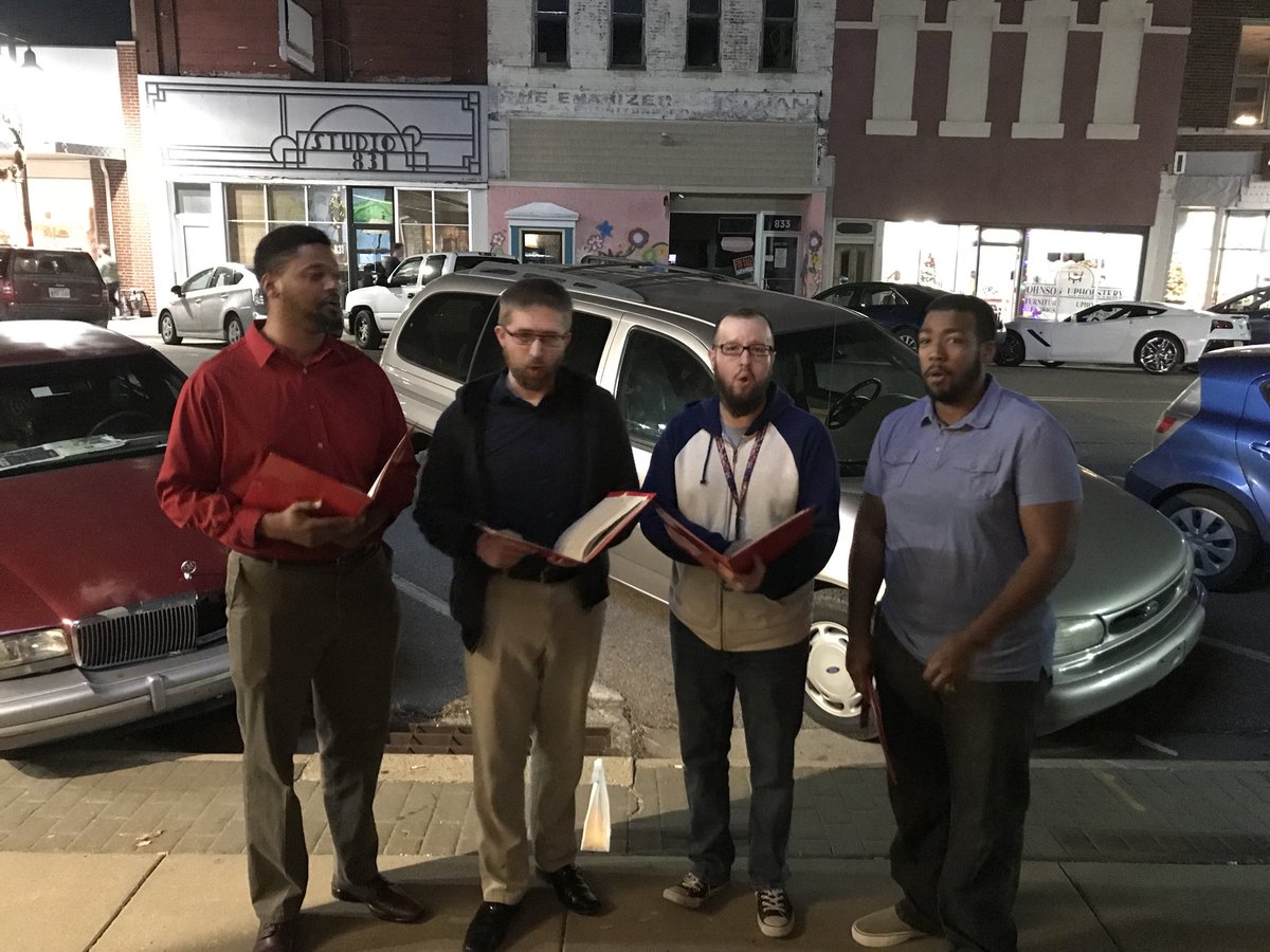 DoubleStufQT's tweet photo. Caroling in #NOTO for their Candlelight Christmas. https://t.co/gKfeTjzFWg
