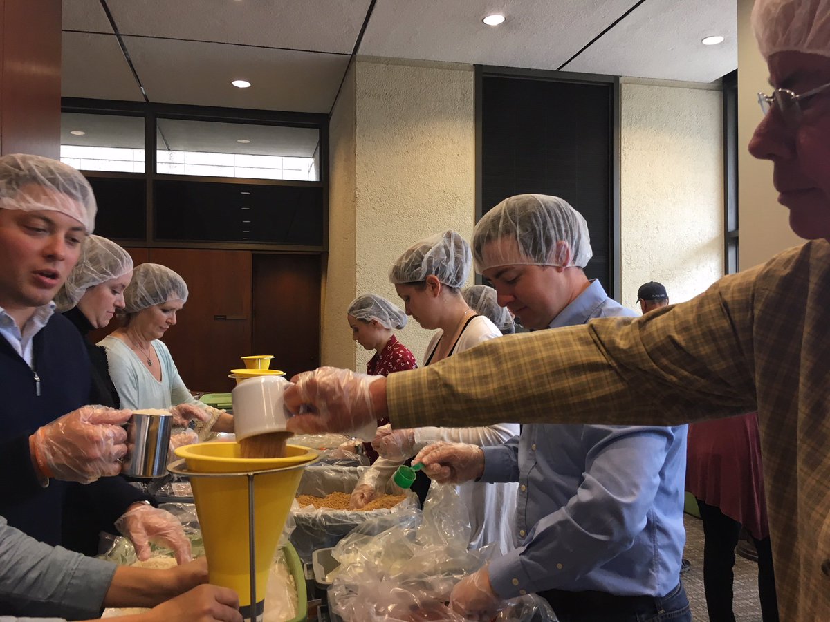 WLJEmployment's tweet photo. WLJ attorneys and staff celebrated Thanksgiving with a #FeedtheFunnel party - packing 10,000 meals for @ThePackShackNWA and our local food pantries! #BeNeighborly #PackShack https://t.co/vjCjlEZHAW