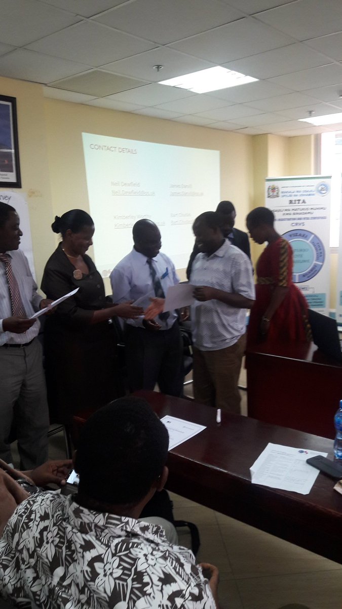FUFUJID's tweet image. Dr. Eric Mwaikambo, Principal Land Surveyor/NSDI lead handling certificates to the gov&apos;t technical officials yesterday in Dar es Salaam #OneWeekDataWranglingWorkshop in #Dar #PORALG #PMODMD #MLHHHSD #MHCDEC #DarMCs #DCC #MOWI #MWTC #NBS #TCRA @OrdnanceSurvey @WBG_ICT