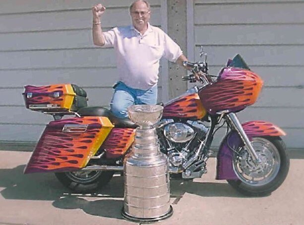 CougarEdmonton's tweet photo. Today we celebrate our dear friend Andy Sydor’s birthday. We sure miss Andy’s daily visits, jokes and being our front office greeter”  #gonetoosoon #cancersucks #flames #paintjob #stanleycup #oldschoolflames https://t.co/z0Xvbfp3Lu