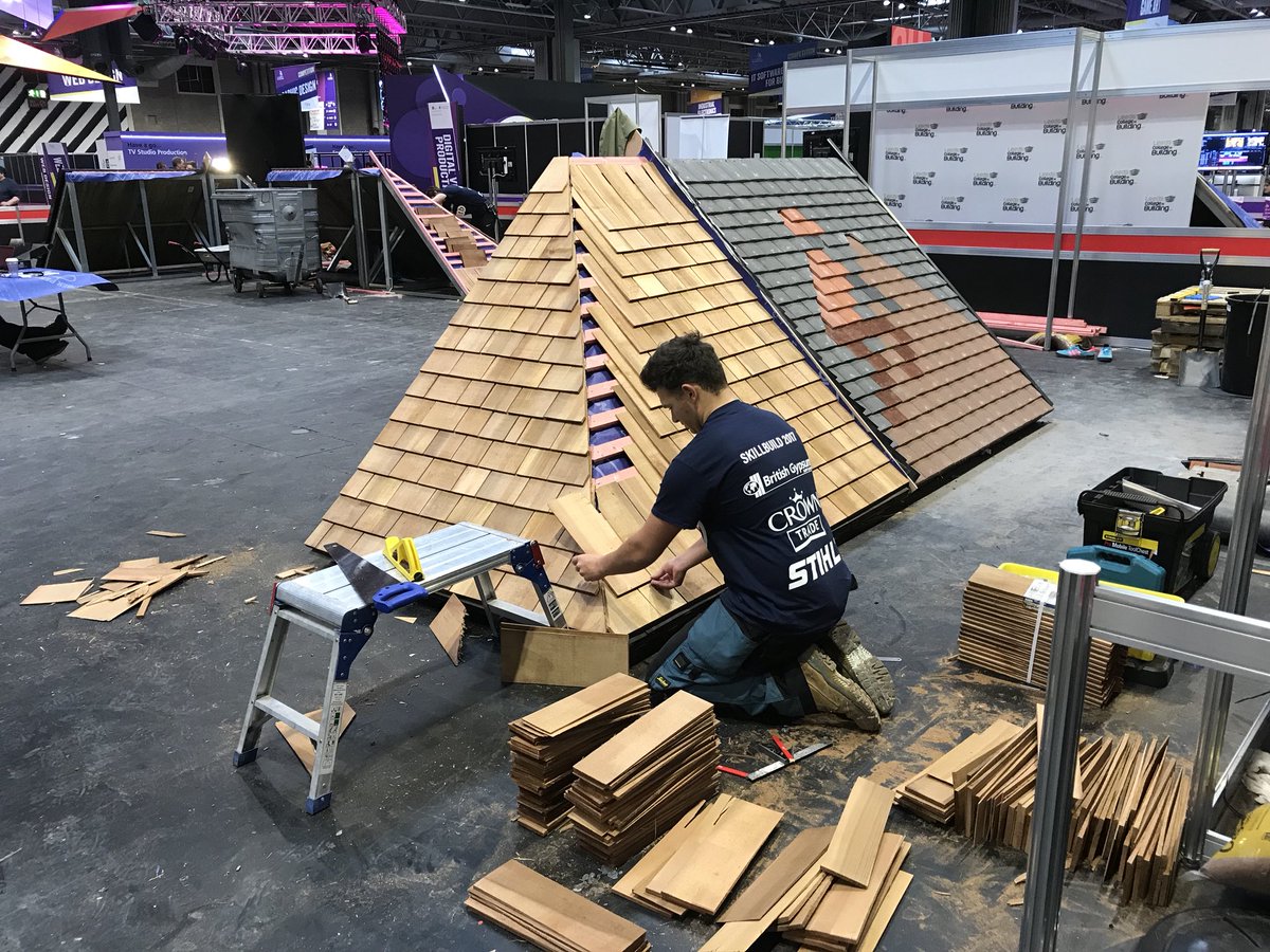 Bobtheslater's tweet photo. Last day at the NEC Skillbuild only the red cedar shingles to complete the roof work https://t.co/h7tyXGjBJ8