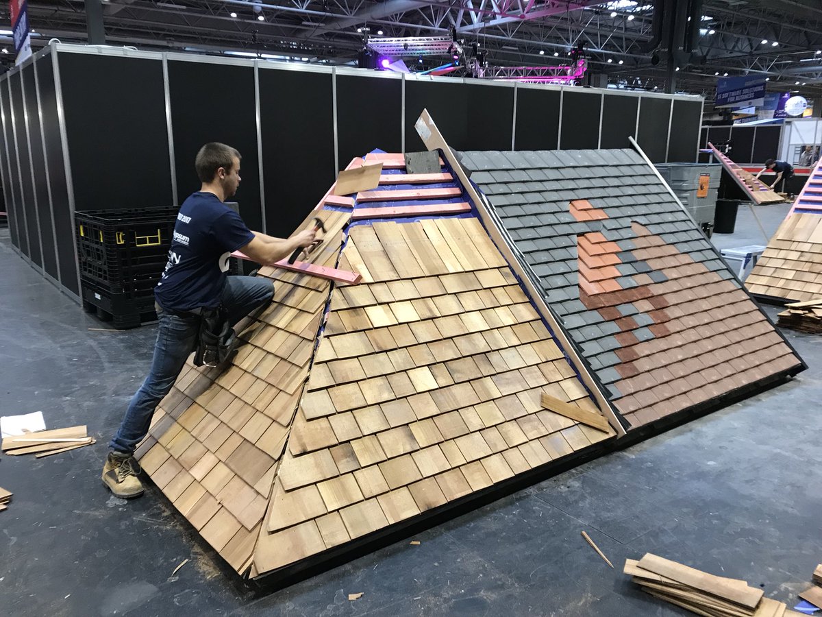 Bobtheslater's tweet photo. Last day at the NEC Skillbuild only the red cedar shingles to complete the roof work https://t.co/h7tyXGjBJ8