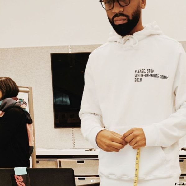 Blavity's tweet photo. Black Designer Featured In Kaep's GQ Shoot Attacked On Instagram, Claps Back Through Dope New Couture https://t.co/DxWZ9sqooX https://t.co/acTIod7pao
