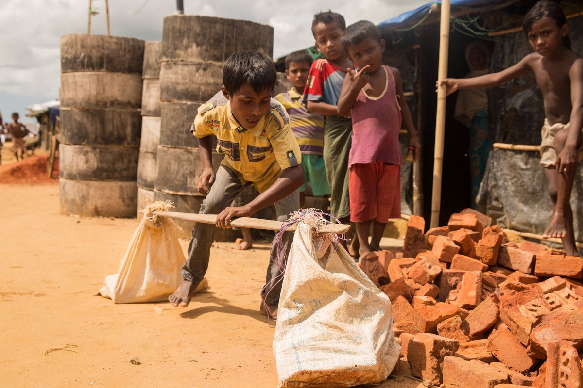 newhumanitarian's tweet photo. Rohingya children in refugee camps get up early but aren't going to school. They are reporting for work. https://t.co/5av3GYs1fQ https://t.co/pvVbk3e4Z4