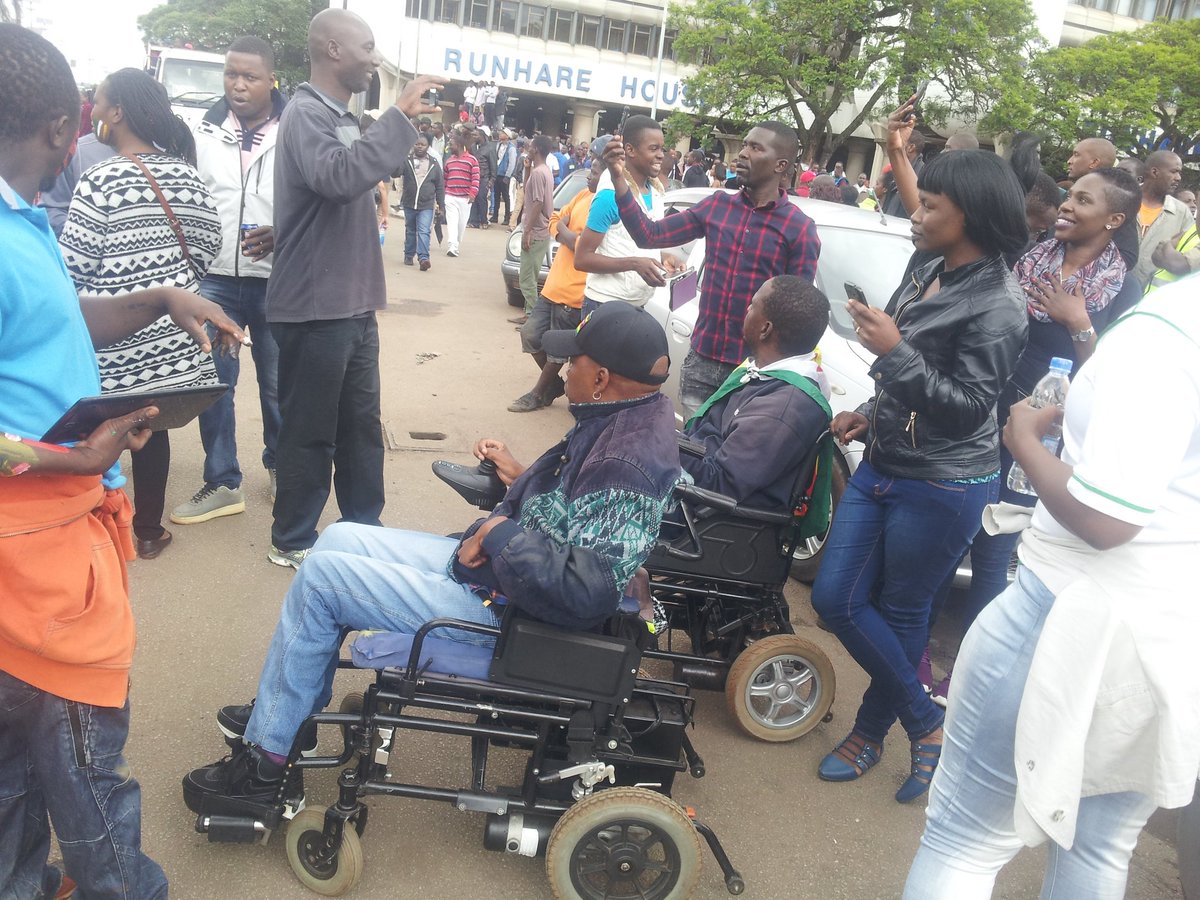 OpenSpaceZW's tweet photo. Members of the disability sector are part of this #HistoricMarch in Harare CBD @DougColtart @citezw @CitManifesto @citezw @organize4zim https://t.co/OjOpA24OG3