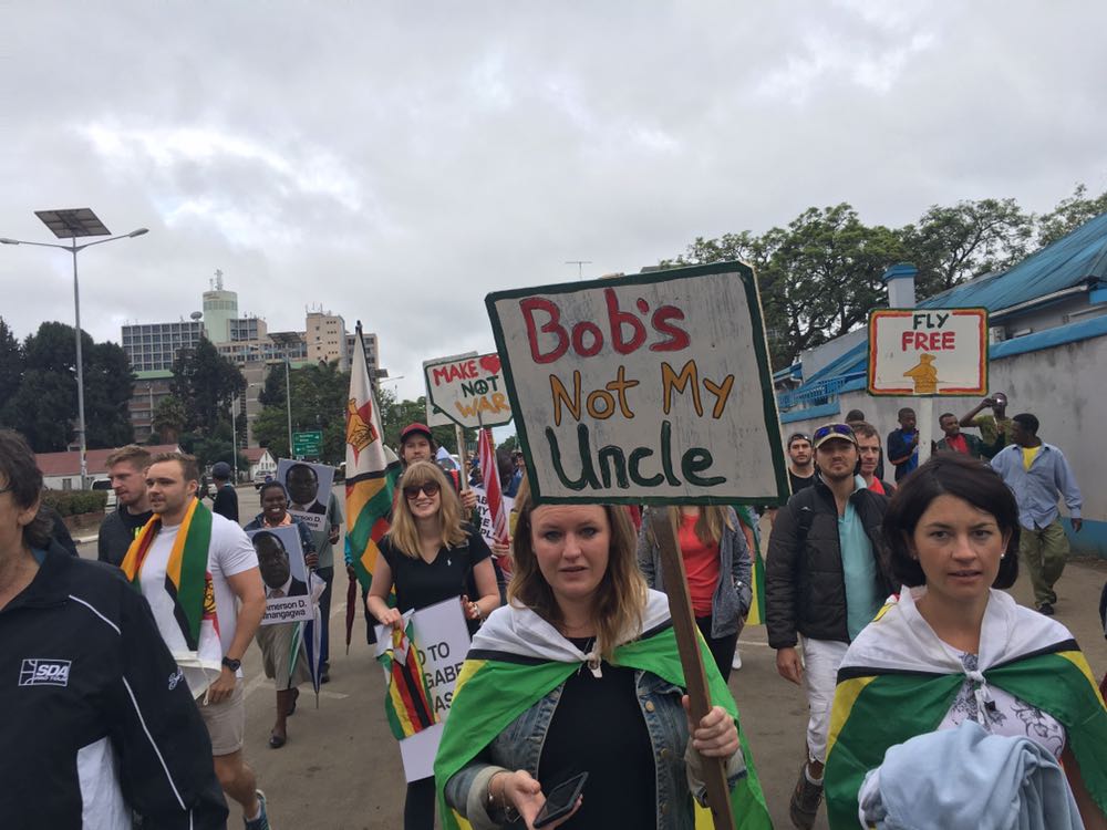 SueNyathi's tweet photo. As a nation we have been mute for 37 years. The army has given us a voice.  #Zimbabwe #SolidarityMarch https://t.co/2iRZukwN0F
