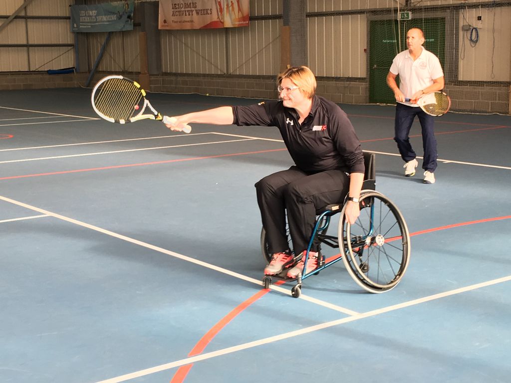 JerseySport's tweet photo. Our CEO giving wheelchair tennis a go at the Disability Sport Awareness Day. Concentration levels high! #inspiringanactivejersey https://t.co/Cb0SOaVMZt