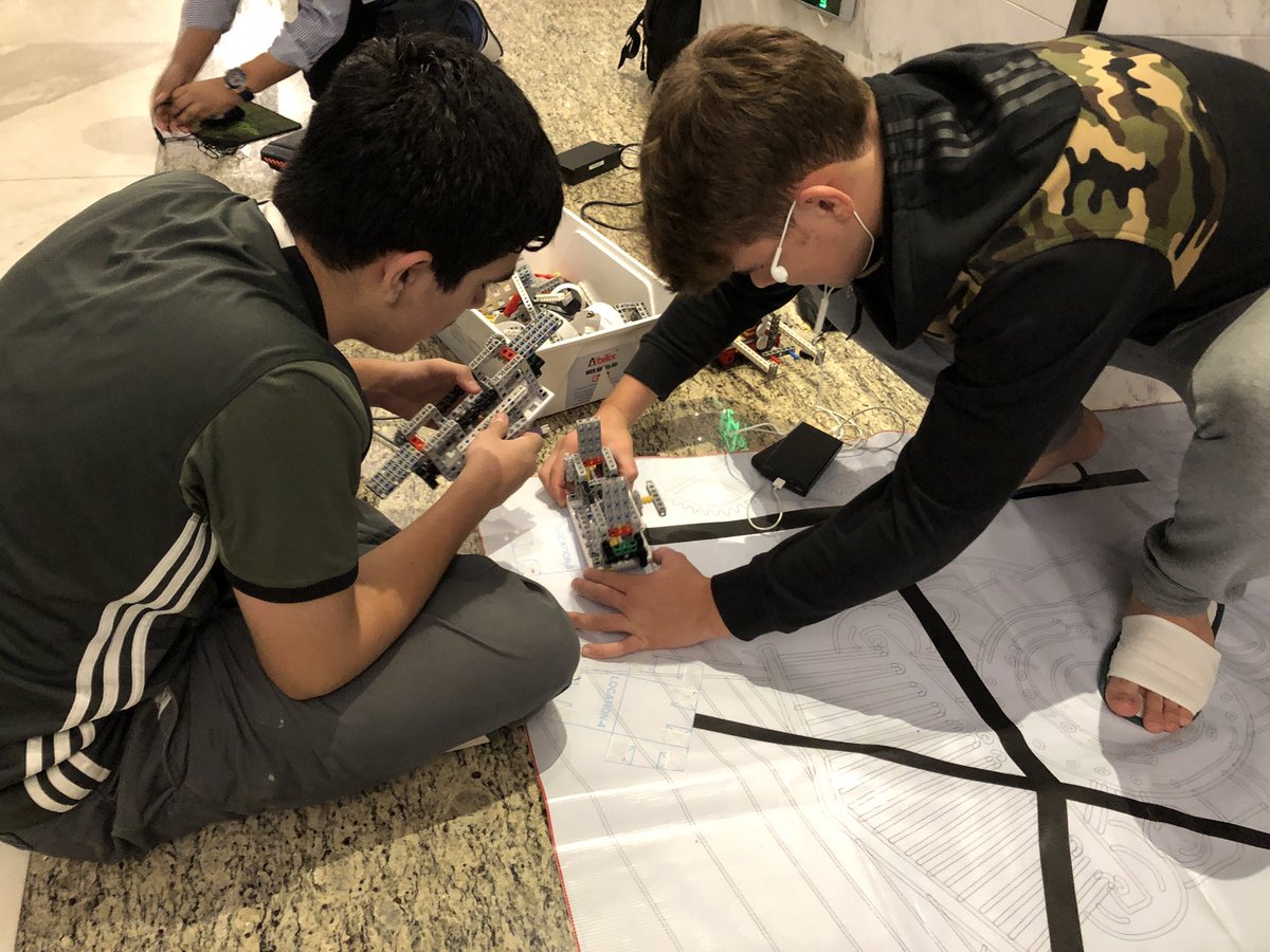 steph_bernier01's tweet photo. #edchatMENA #designthinking My students are practising for the #WER2017 Day 2. Each station must be reached by the Robot with a different mechanism to perform tasks. Analyze, design, implement & evaluate. Feedback/communication is constant. #STEM #ROBOTICS @VISSDigitalTech https://t.co/ZBdDG2NfHY