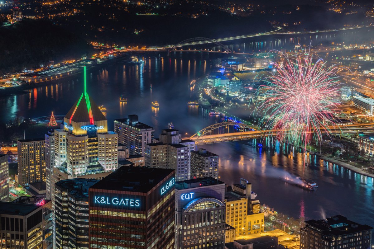 DaveDiCello's tweet photo. Another view of the beautiful Light Up Night fireworks in #Pittsburgh last night, as the Highmark Building lights up a festive red and green and the tree glows at the Point https://t.co/AXNL5s6dXb