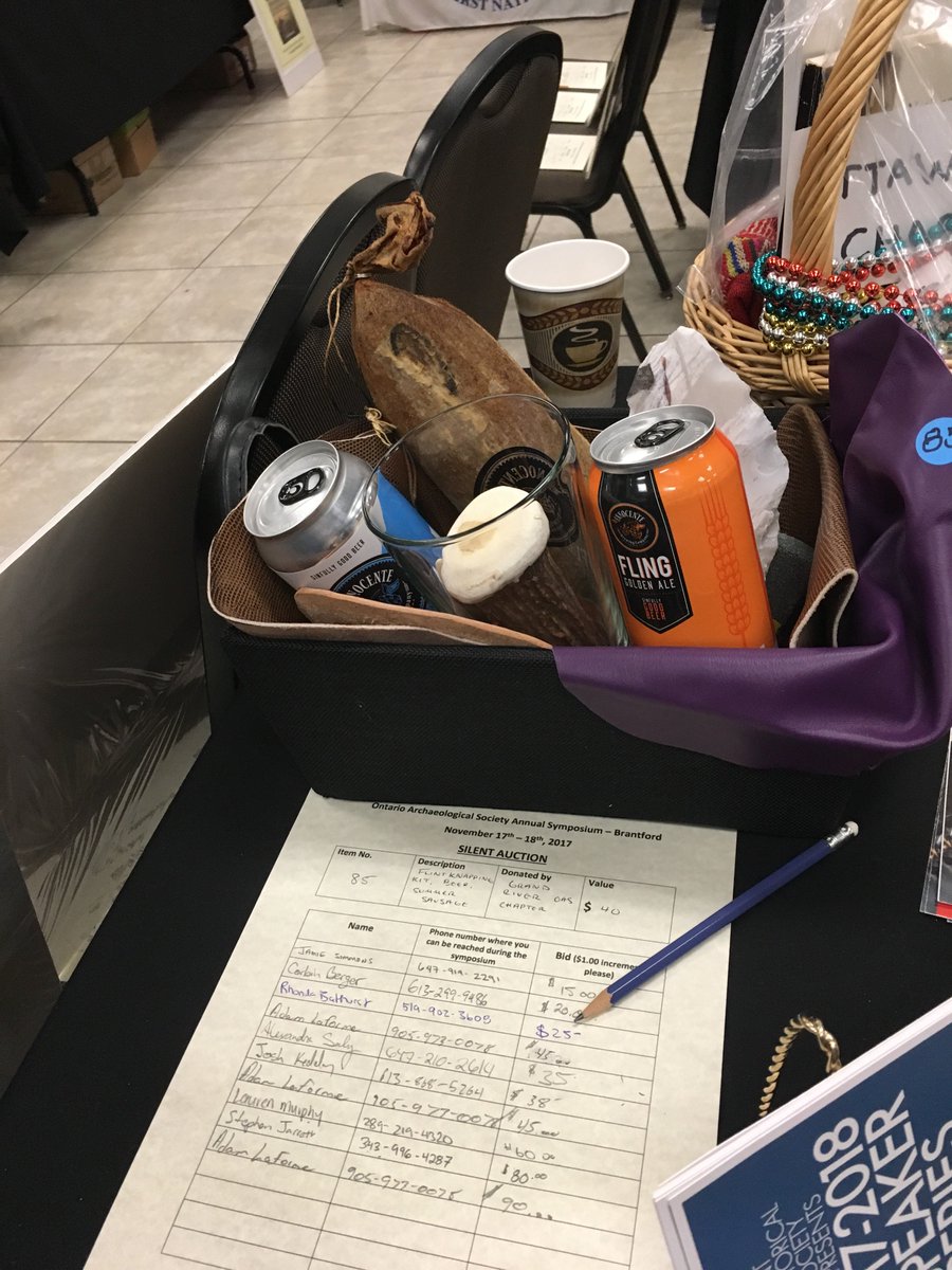 MuseOntArch's tweet photo. There are all sorts of goodies at the silent auction table at the OAS symposium #OAS2017 #ontarioarchaeology https://t.co/NnMSrbu3S8