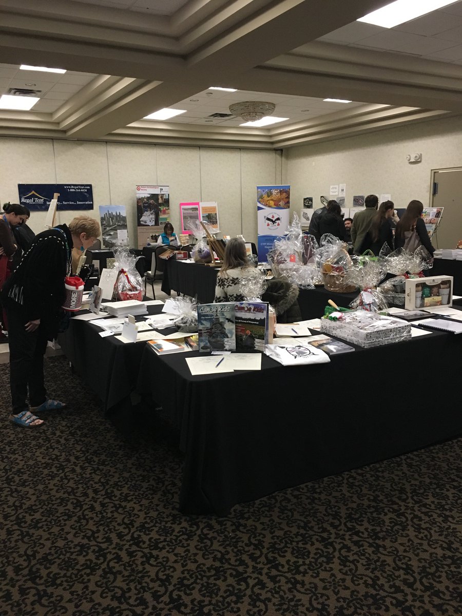 MuseOntArch's tweet photo. There are all sorts of goodies at the silent auction table at the OAS symposium #OAS2017 #ontarioarchaeology https://t.co/NnMSrbu3S8