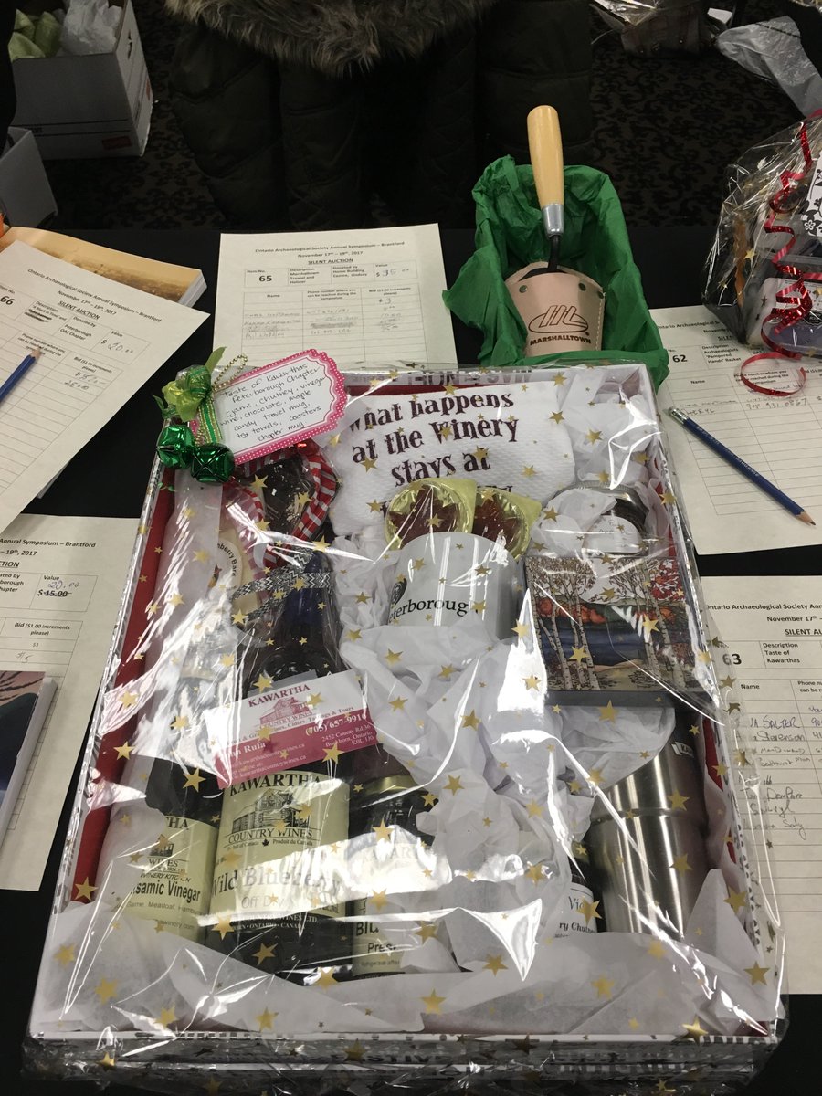 MuseOntArch's tweet photo. There are all sorts of goodies at the silent auction table at the OAS symposium #OAS2017 #ontarioarchaeology https://t.co/NnMSrbu3S8