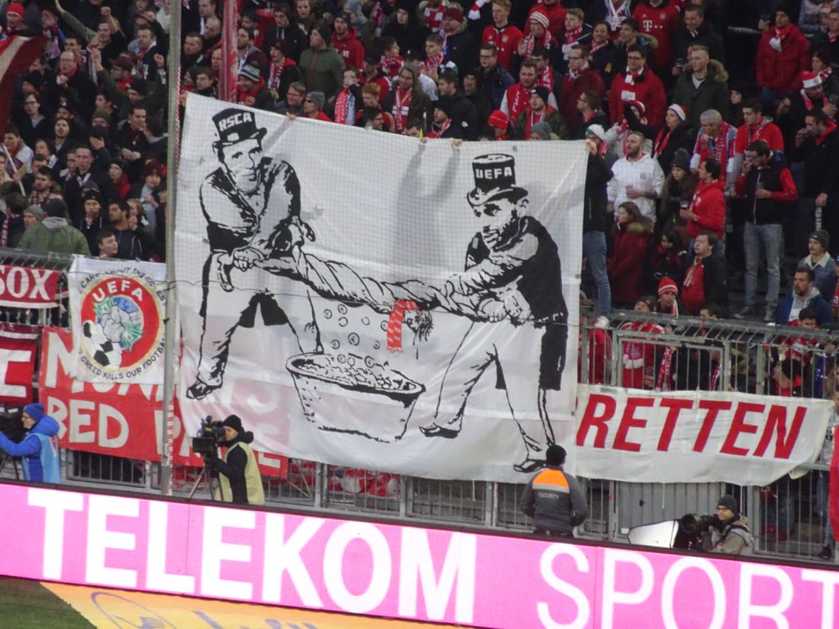 Image result for UEFA investigating Bayern after fans throw fake money on the pitch