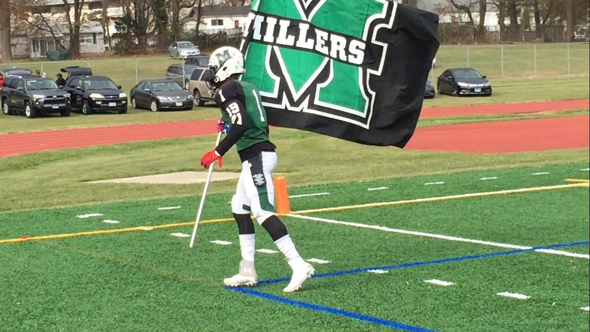 Milford Mill's Ugo Obasi with some important hardware for today's regional final against Edgewood.