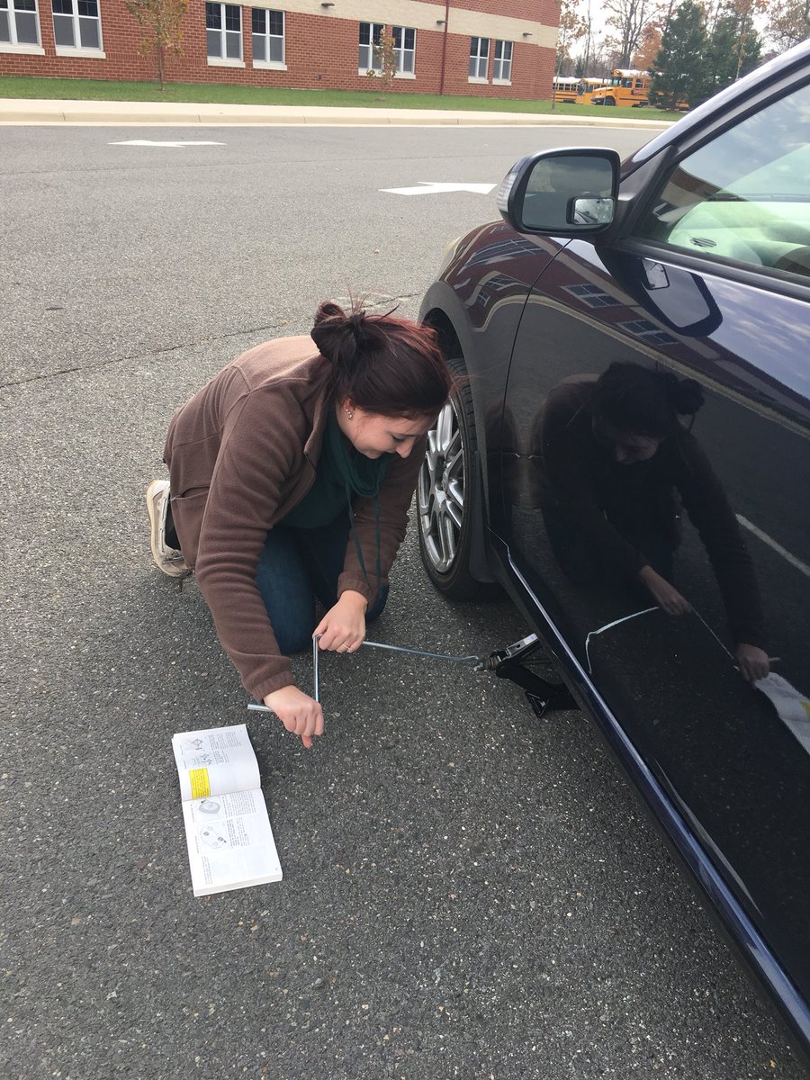 Just two math teachers changing a flat 🚙 @misskelley722