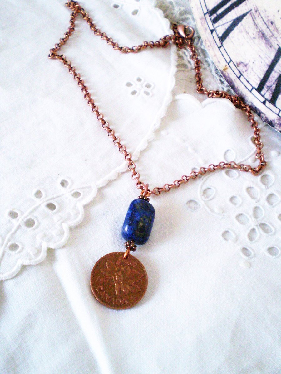 Joannetcetera's tweet photo. Excited to share a favourite from my #etsy shop: Customised Copper Penny Necklace with Lapis Lazuli Stone - #Canadianpenny, choose a year, milestone year, #personalised, #souvenir, maple leaf #jewelry #necklace #copper #lapislazuli https://t.co/dn53ttVJoJ https://t.co/g5ANNsdgN6