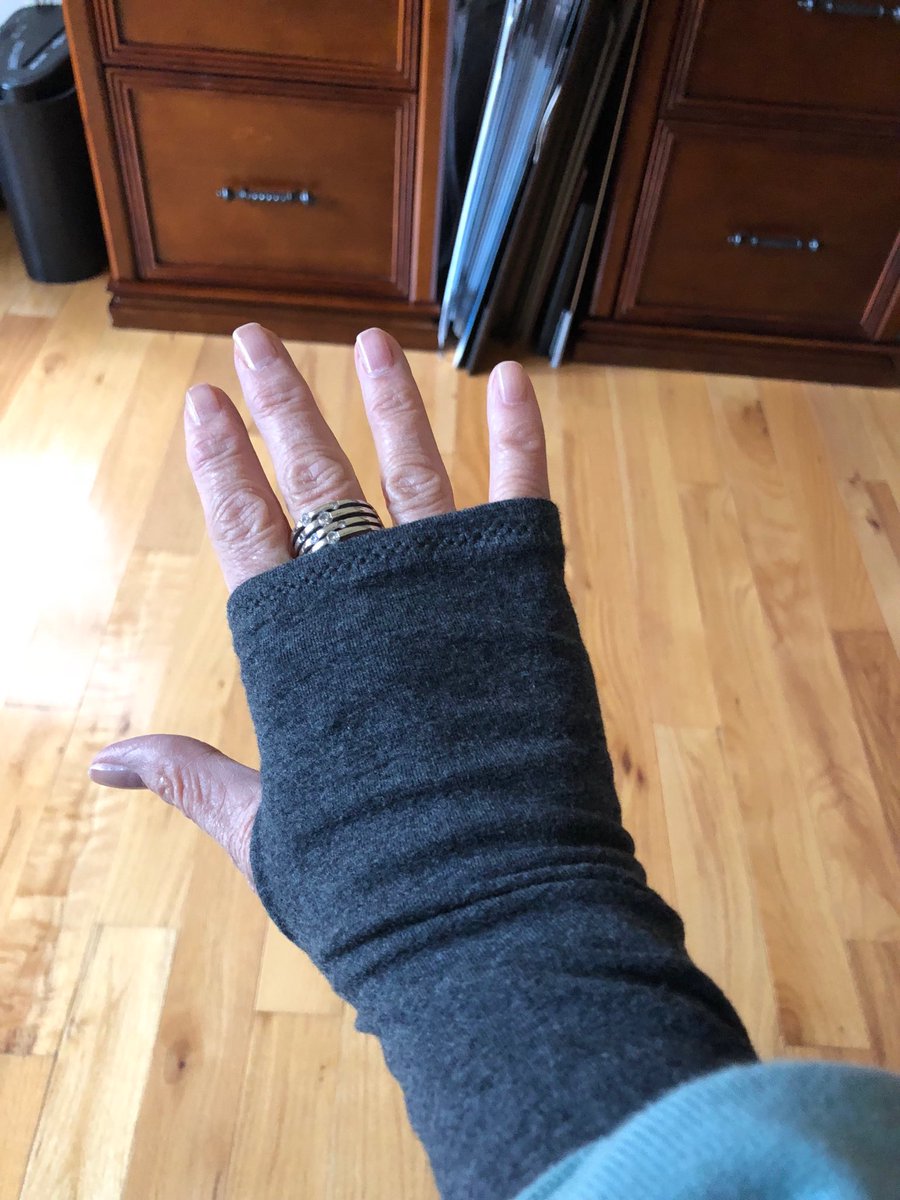 ReneeRegent's tweet photo. I finally broke down and got these comfy fingerless gloves. No more cold hands while writing! #winteriscoming #WriterProblems #amwriting https://t.co/53qiZJvXVO
