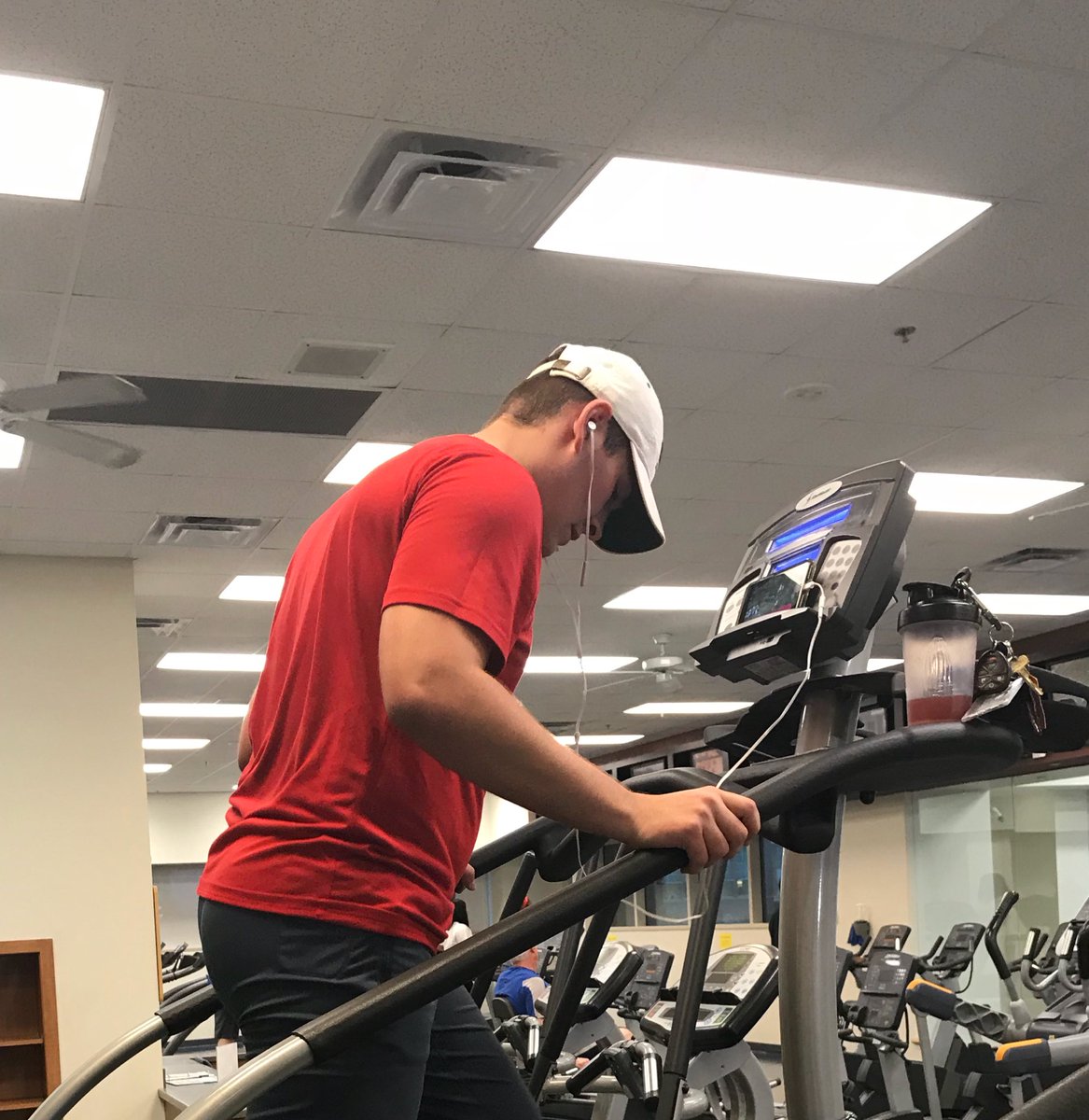 ZachSeabaugh's tweet photo. Here’s a dramatic picture. I’m actually working out, and I’m watching Georgia play on my phone because they stress me out when I’m sitting on the couch. https://t.co/jgCY47ja79
