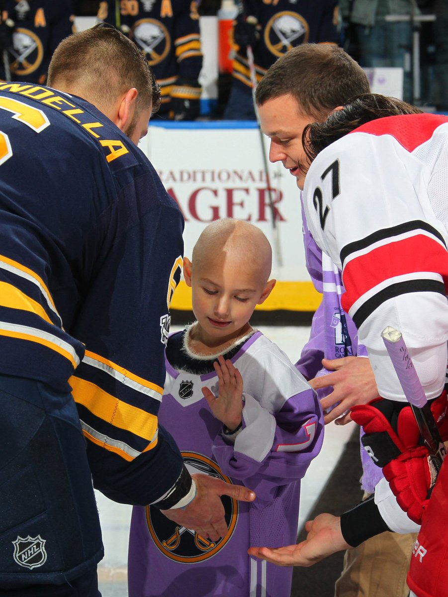 BuffaloSabres's tweet photo. Retweet to show your support for Lucy who dropped the puck in tonight's pregame ceremony with Cameron. #HockeyFightsCancer 💜 https://t.co/NpA3R1g8bi